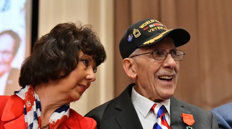 Louis Graziano, a 98-year-old World War II veteran who is believed to be the sole surviving witness to the Nazi surrender in 1945, received the French Legion of Honor at a moving ceremony in Thomson Friday. (Hyosub Shin/Hyosub.Shin@ajc.com)
