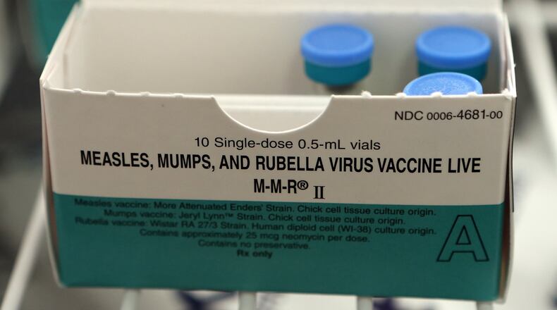Health officials urge parents to have their children vaccinated. AJC FILE PHOTO