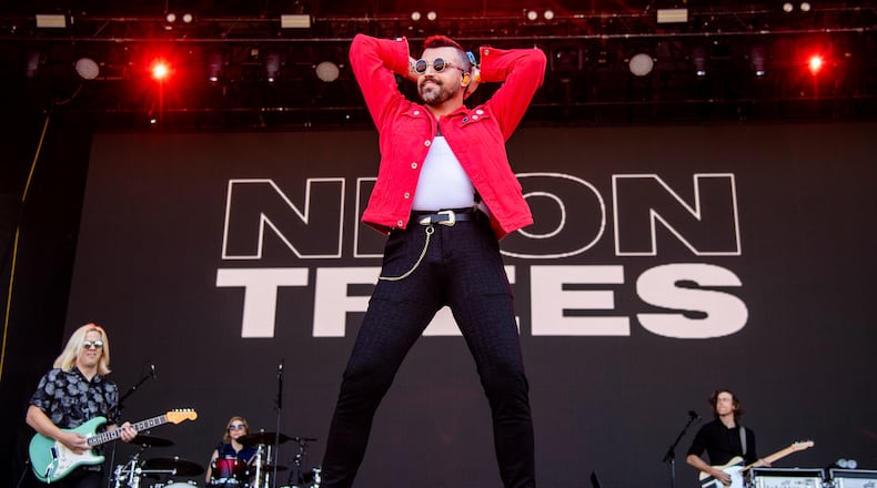 Chris Allen, from left, Elaine Bradley, Tyler Glenn and Branden Campbell of Neon Trees performs at the Innings Festival at Raymond James Stadium Ground on Sunday March 20, 2022, in Tampa, Florida. (Photo by Amy Harris/Invision/AP)