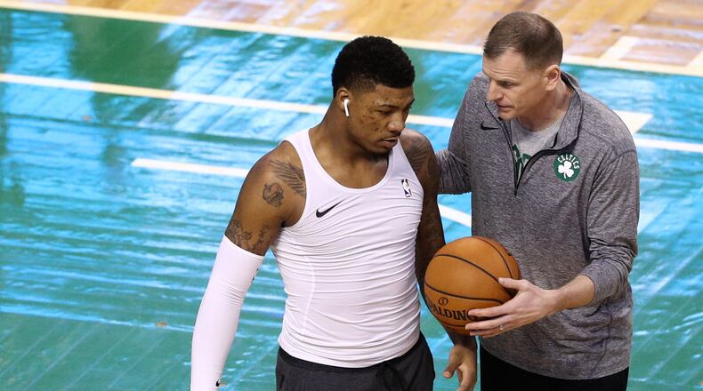 Celtics assistant coach Jay Larranaga works with Marcus Smart before Game Five of Round One of the 2018 NBA Playoffs April 24, 2018, against the Milwaukee Bucks at TD Garden in Boston.