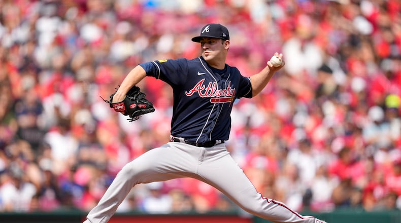 Atlanta Braves starting pitcher Jared Shuster throws against the Cincinnati Reds in the first inning of a baseball game Saturday, June 24, 2023, in Cincinnati. (AP Photo/Jeff Dean)