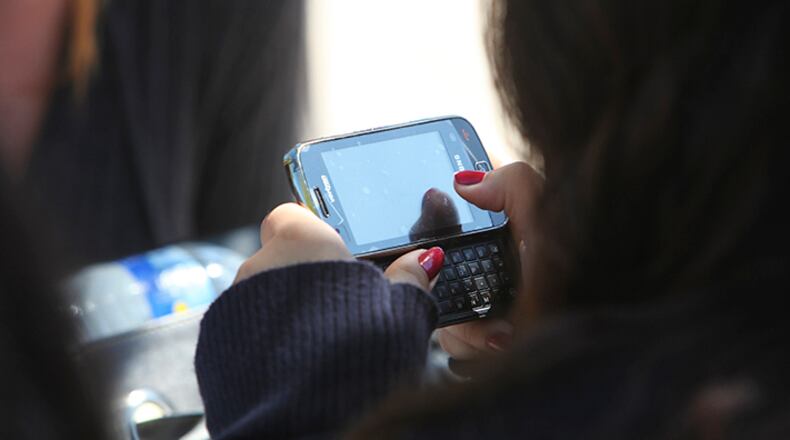 Parents expect schools to step in when teens use cellphones for sexting, but is that the school's role?