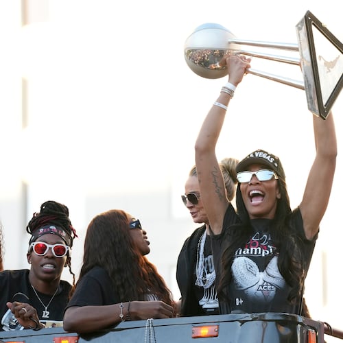 Las Vegas Aces forward A'ja Wilson celebrates during a rally to celebrate the team's WNBA championship Friday, Oct. 17, 2025, in Las Vegas. (AP Photo/Candice Ward)