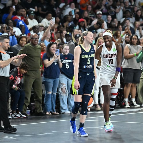 “Our confidence is not going to waver because we didn’t shoot well tonight,” said Atlanta Dream guard Rhyne Howard, shown here last month with Dallas Wings guard Paige Bueckers. (Hyosub Shin / AJC)