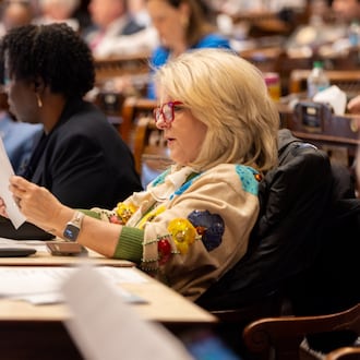 State Rep. Angie O’Steen, R-Ambrose, reviewed a bill in the House of Representatives at the Capitol in Atlanta on Crossover Day, Thursday, March 6, 2025. (Arvin Temkar/AJC)
