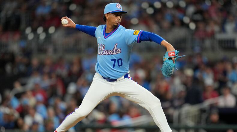 Atlanta Braves pitcher Osvaldo Bido (70) works in the ninth inning of a baseball game against the Cleveland Guardians, Friday, April 10, 2026, in Atlanta. (AP Photo/Mike Stewart)