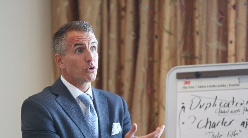 Fulton County school Superintendent Jeff Rose speaks with school board members at a meeting. EMILY JENKINS/ EJENKINS@AJC.COM