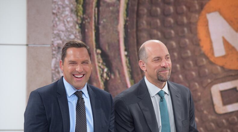 Mark DeRosa (left) in the MLB Network studio alongside his former Braves teammate John Smoltz.
