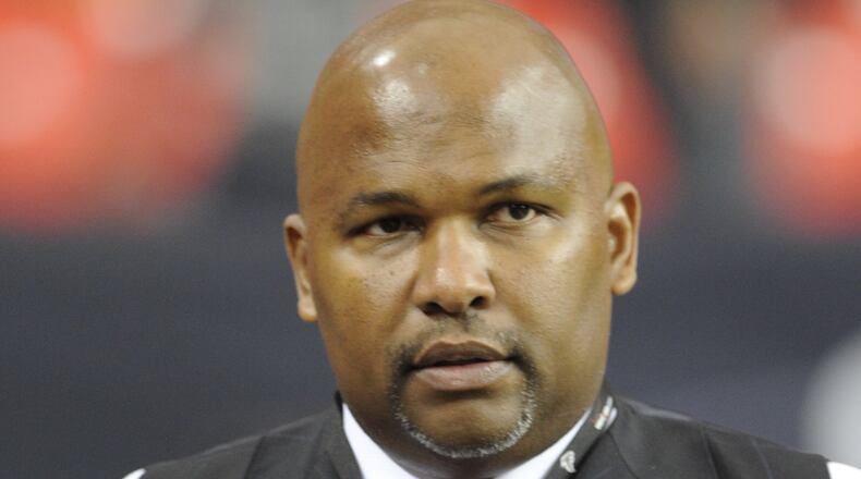 ATLANTA - NOVEMBER 23: Vice President of Football Communications Reggie Roberts of the Atlanta Falcons walks on the field before the game against the Carolina Panthers at the Georgia Dome on November 23, 2008 in Atlanta, Georgia. (Photo by Al Messerschmidt/Getty Images)