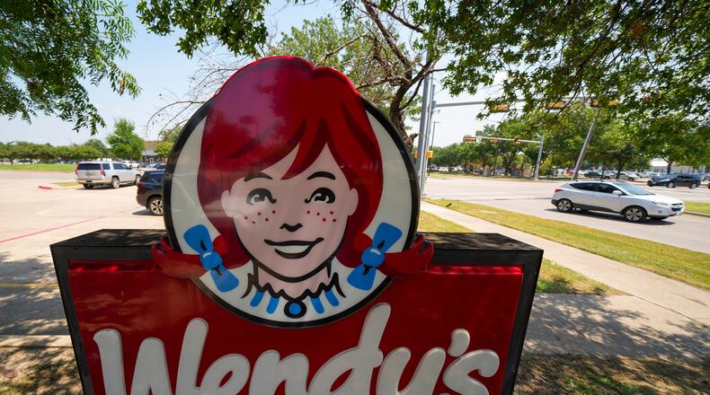 FILE - A sign is seen at a Wendy's restaurant Tuesday, Aug. 5, 2025, in Garland, Texas. (AP Photo/Julio Cortez, File)