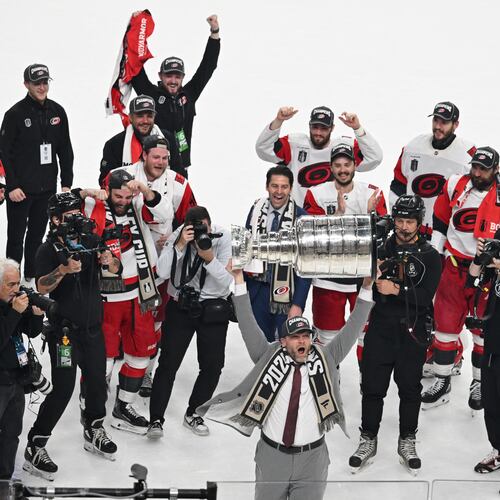 The Carolina Hurricanes celebrates after a win over the Vegas Golden Knights in Game 6 of the NHL hockey Stanley Cup Final series, Sunday, June 14, 2026, in Las Vegas. (AP Photo/Candice Ward)