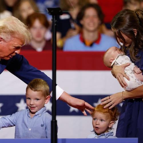 President Donald Trump greets members of the Loden family, who signed up for Trump Accounts, during his rally at Wheeler High School on Wednesday, July 22, 2026, in Marietta. (Arvin Temkar/AJC)