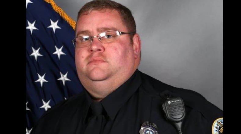 A Nashville police officer was listed in stable condition Friday after being shot in the morning at a Dollar General store parking lot, according to officials. The officer was identified by the Nashville Metropolitan Police Department as Josh Baker. (Nashville Metropolitan Police Department)