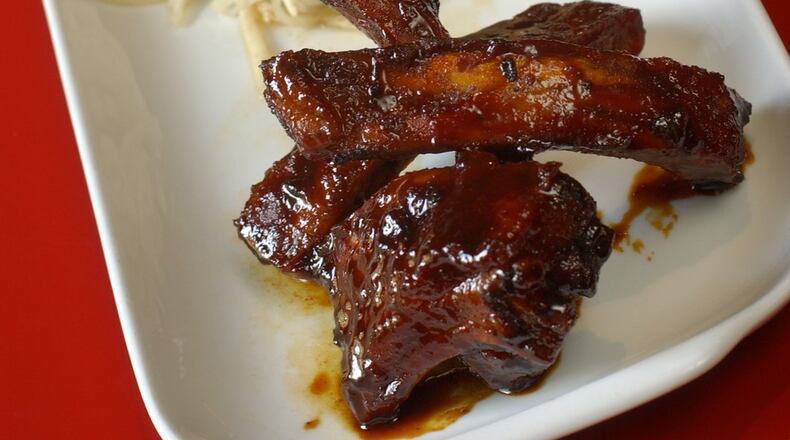 The Coca-Cola Glazed Baby Back Ribs are photographed with with jicama apple slaw from Commune restaurant in 2003. AJC file