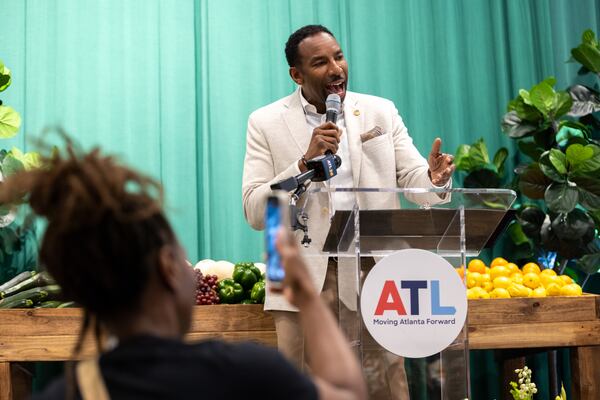 Atlanta Mayor Andre Dickens, here speaking at a business grand opening last month, met last weekend with businesses owners, first responders and hospital staff about the recent violence along Edgewood Avenue. (Arvin Temkar/AJC)