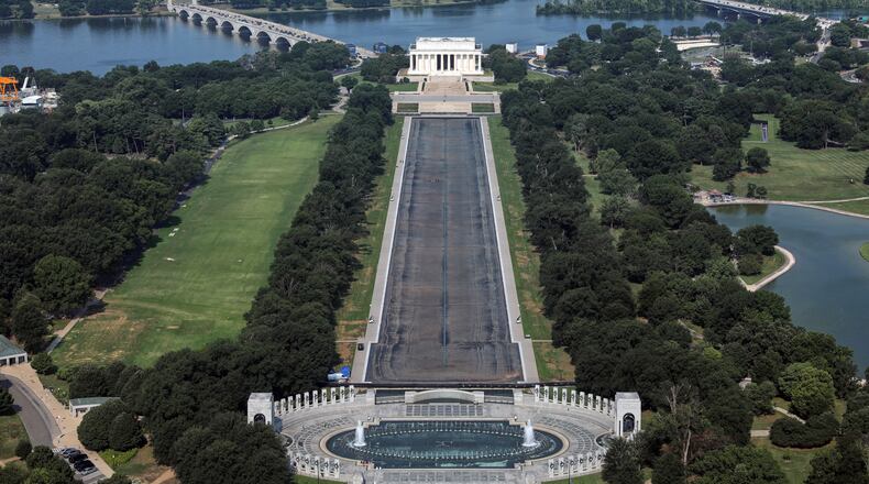 The Lincoln Memorial and the Reflecting Pool are seen from the Washington Monument, Wednesday, July 15, 2026, in Washington. (AP Photo/Rahmat Gul)