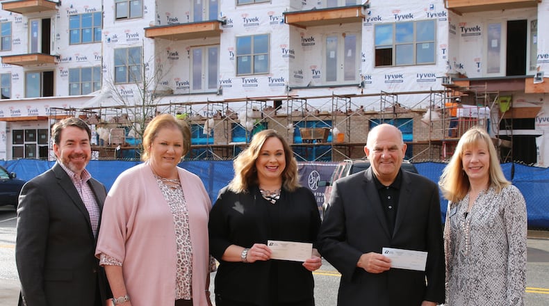 Left to right: Sugar Hill’s Assistant City Manager Troy Besseche, City Clerk Jane Whittington, HR & Executive Services Manager Robyn Adams, and City Manager Paul Radford are joined by Georgia Municipal Association Managing Director Georgia City Solutions Kay Love.