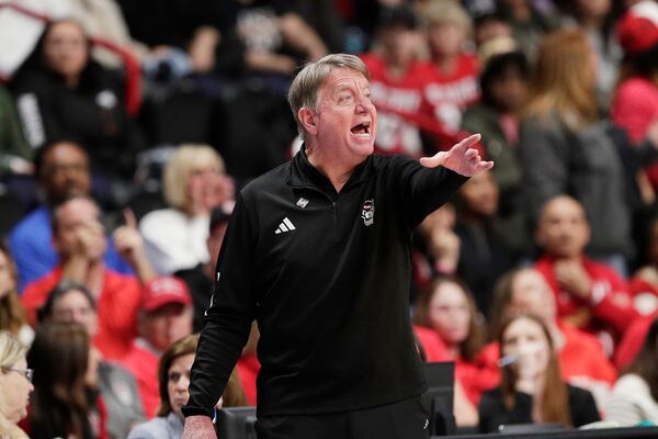 North Carolina State head coach Wes Moore directs his team during the first half against LSU in the Sweet 16 of the NCAA college basketball tournament Friday, March 28, 2025, in Spokane, Wash. (AP Photo/Young Kwak)