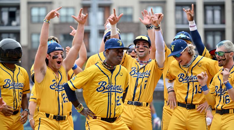 Savannah Bananas players and coaches dance during first of three-game series at Coolray Field, Saturday, March 23, 2024, in Lawrenceville. The Savannah Bananas’ visit is their first to the Atlanta area since their founding in 2016. The team is based in their namesake Georgia city and plays 30-plus games a year at Historic Grayson Stadium, a century-old ballpark on Savannah’s eastside. (Hyosub Shin / Hyosub.Shin@ajc.com)