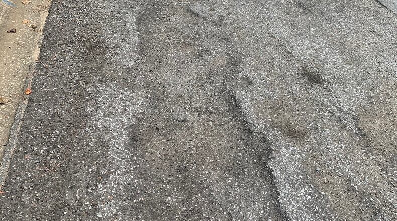 Sally Littlejohn hopes this street will soon be fixed.