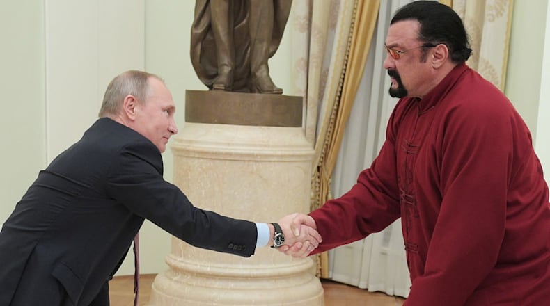 Russian President Vladimir Putin presented actor Steven Seagal with a Russian passport in November.
