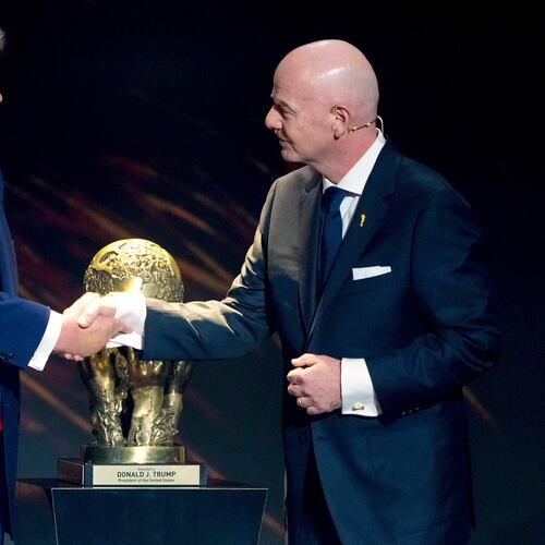 FILE - FIFA President Gianni Infantino, right, awards President Donald Trump with the FIFA Peace Prize during the draw for the 2026 soccer World Cup at the Kennedy Center in Washington, Dec. 5, 2025. (AP Photo/Chris Carlson, File)