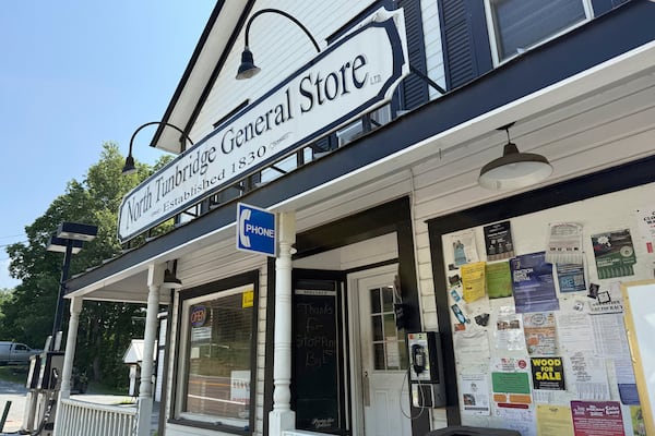 A phone installed by engineer Patrick Schlott is pictured outside the North Tunbridge General Store on Wednesday, July 16, 2025, in Tunbridge, Vt. (AP Photo/Amanda Swinhart)