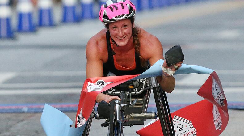 Tatyana McFadden repeated as the women’s wheelchair division in the 2016 AJC Peachtree Road Race with at time 24:16.