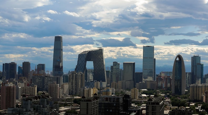 BEIJING, CHINA - JUNE 12: A general view shows the headquarter of China Central Television amid the Beijing skyline at central business district on June 12, 2015 in Beijing, China. (Photo by Lintao Zhang/Getty Images)