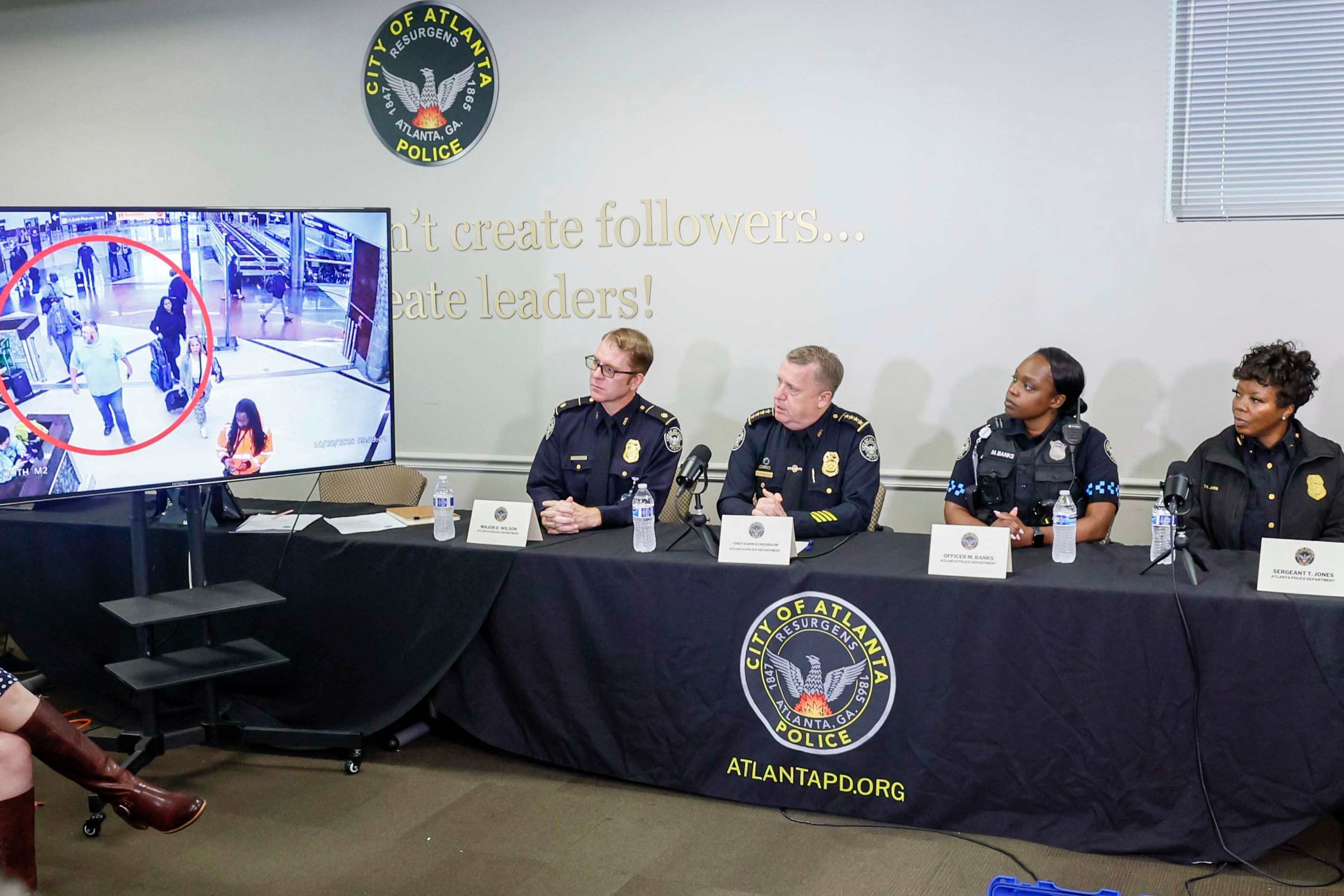 Atlanta Police Chief Darin Schierbaum, along with Major David Wilson and the officers involved in the arrest of Billy Joel Cagle at Hartsfield-Jackson Atlanta International Airport, speak during a news conference, Tuesday, Oct. 21, 2025. (Miguel Martinez/AJC)