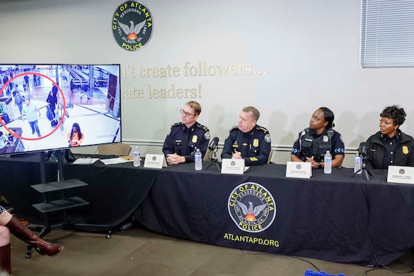 Atlanta Police Chief Darin Schierbaum, along with Major David Wilson and the officers involved in the arrest of Billy Joel Cagle at Hartsfield-Jackson Atlanta International Airport, speak during a news conference, Tuesday, Oct. 21, 2025. (Miguel Martinez/AJC)