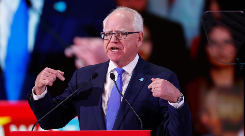 Gov. Tim Walz, D-Minn., delivers a speech at the Global Progressive Mobilisation summit in Barcelona, Spain, Saturday, April 18, 2026. (AP Photo/Joan Monfort)