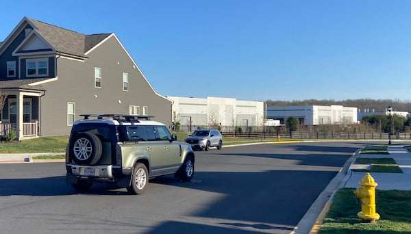 Data centers are a common sight in Northern Virginia neighborhoods. One local proponent says that data centers generate more than three times the taxable value per square foot compared to the next most valuable type of development. (Zachary Hansen/AJC)