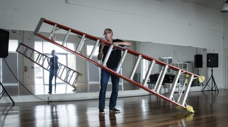 Sam Ross, co-founder of the new Windmill Arts Center in East Point, is shown on Nov. 8, 2017, inside the property that he has been renovating. (John Amis for the AJC)