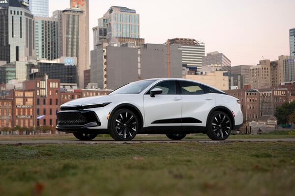 This photo provided by Toyota shows the 2025 Crown. The Crown is a big sedan with a distinctive, raised look. Its hybrid powertrain also helps it get up to an estimated 41 mpg combined. (Courtesy of Toyota Motor Sales U.S.A. via AP)