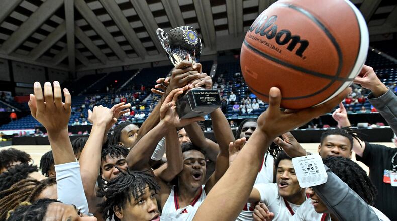 Sandy Creek players celebrate their win over Johnson-Savannah during GHSA Basketball Class 3A Boy’s State Championship game at the Macon Centreplex, Friday, Mar. 8, 2024, in Macon. Sandy Creek won 74-49 over Johnson-Savannah. (Hyosub Shin / Hyosub.Shin@ajc.com)