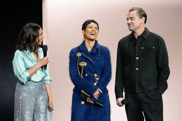 Regina Hall, from left, Teyana Taylor, and Leonardo DiCaprio, cast members of the upcoming film "One Battle After Another," speak during the Warner Bros. Pictures presentation at CinemaCon on Monday, April 1, 2025, at Caesars Palace in Las Vegas. (AP Photo/Chris Pizzello)