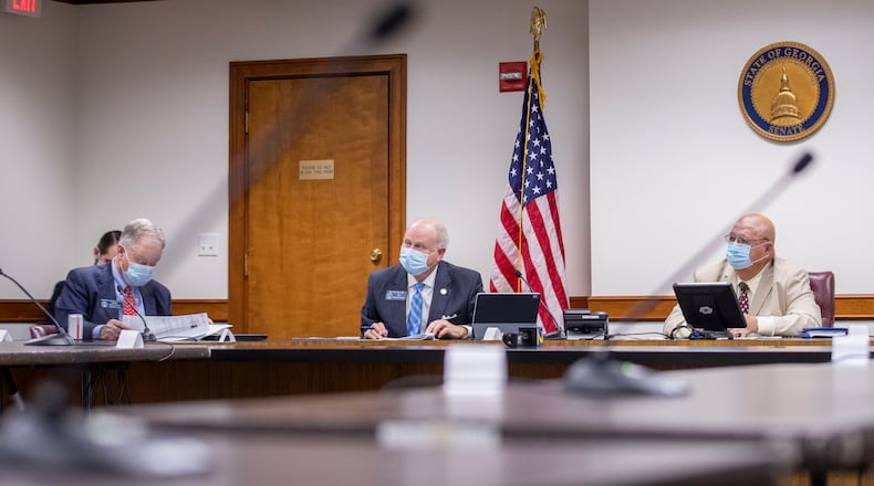 Georgia Senators John Wilkinson (R - Toccoa) (from left), Butch Miller (R - Gainesville) and Ellis Black (R - Valdosta) take part in a Senate appropriations subcommittee meeting . (ALYSSA POINTER / ALYSSA.POINTER@AJC.COM)