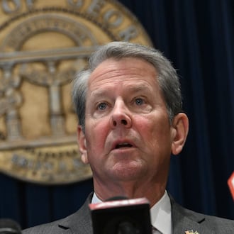 Gov. Brian Kemp speaks before signing the state’s new budget at the Georgia Capitol on Tuesday, May 12, 2026, in Atlanta. Kemp signed the budget, but not without trimming about $300 million of spending approved by the General Assembly just last month. (Hyosub Shin/AJC)