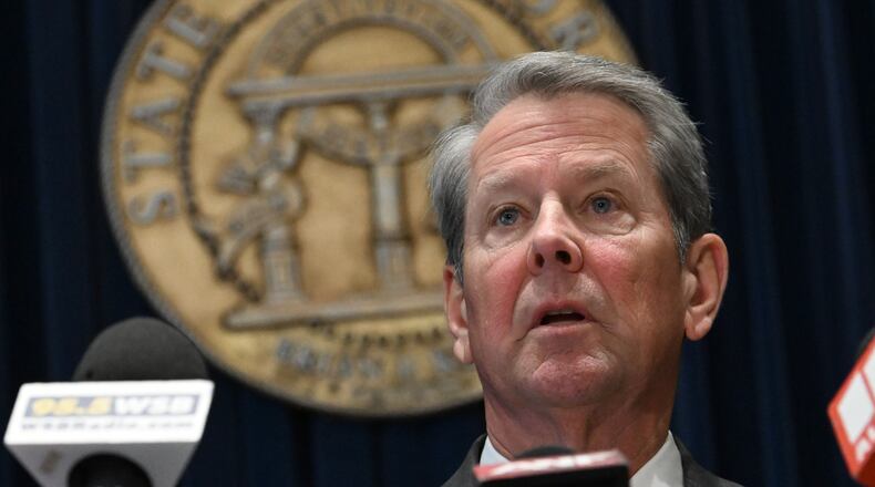 Gov. Brian Kemp speaks before signing the state’s new budget at the Georgia Capitol on Tuesday, May 12, 2026, in Atlanta. Kemp signed the budget, but not without trimming about $300 million of spending approved by the General Assembly just last month. (Hyosub Shin/AJC)