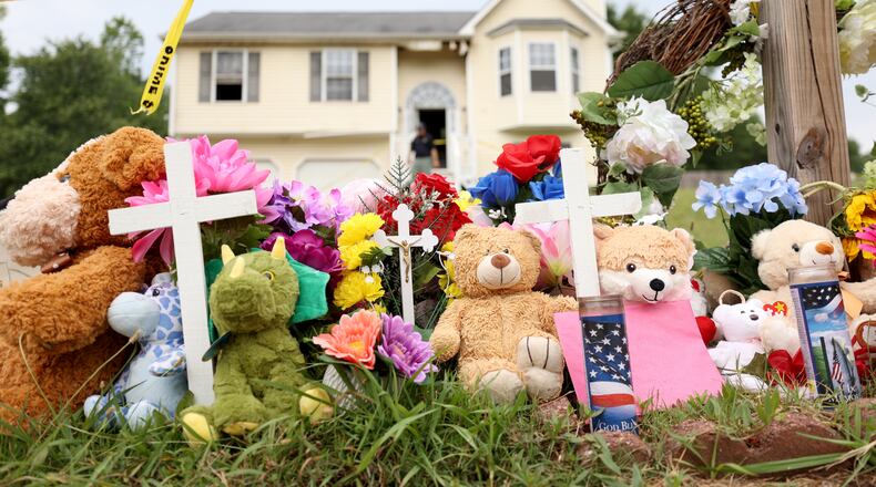 062722 Rockmart, Ga..: A memorial is shown at the home of where three children died on Woodwind Drive, Friday in Paulding County, Monday, June 27, 2022, in Rockmart, Ga.. The mother of the children, Darlene Brister, 40, is charged with two counts of malice murder following the deaths. (Jason Getz / Jason.Getz@ajc.com)