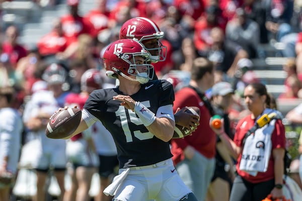 Alabama quarterback Ty Simpson (15) throws the ball during Alabama's A-Day NCAA college football practice and autograph session, Saturday, April 12, 2025, in Tuscaloosa, Ala. (AP Photo/Vasha Hunt)