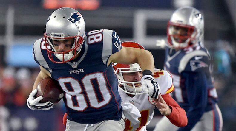 New England Patriots receiver Danny Amendola (80) returns a fourth-quarter punt 22 yards before being pushed out of bounds by the Kansas City Chiefs’ James Winchester (41) in the AFC divisional playoffs on Saturday, Jan. 16, 2016, at Gillette Stadium in Foxborough, Mass. The Patriots advanced, 27-20. (John Sleezer/Kansas City Star/TNS)