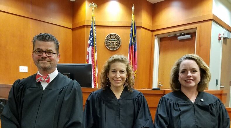 DeKalb Magistrate Judges Matthew McCoyd, September Guy and Hollie Manheimer will oversee a newly formed court effort to clean-up blighted properties.