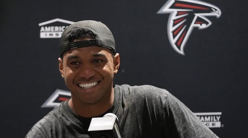 Falcons quarterback Tua Tagovailoa — pictured speaking speaks at a news conference after Atlanta's game against the Dolphins Friday, Aug. 28, 2026 — said in March that he doesn't write his own social media posts. (Lynne Sladky/AP)