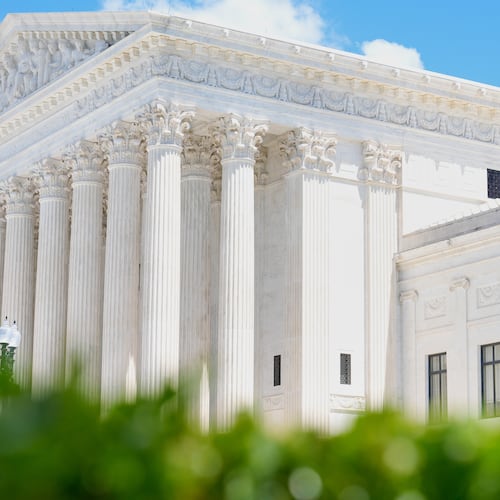 A statue titled the "Authority of Law" sits in front of the Supreme Court on Friday, May 15, 2026, in Washington. (AP Photo/Mariam Zuhaib)