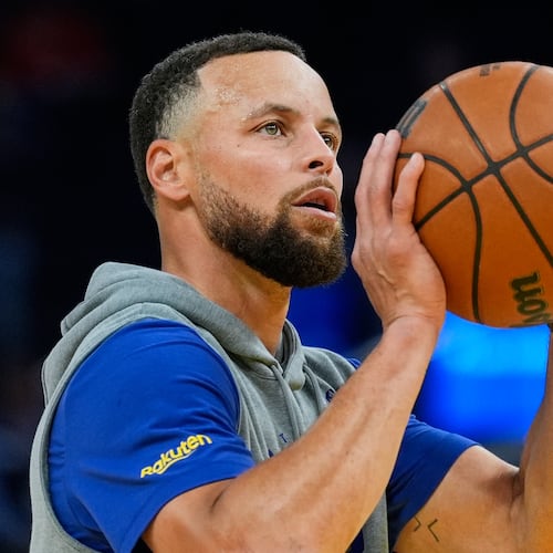 Golden State Warriors guard Stephen Curry warms up before an NBA basketball game against the Houston Rockets, Sunday, April 5, 2026, in San Francisco. (AP Photo/Godofredo A. Vásquez)