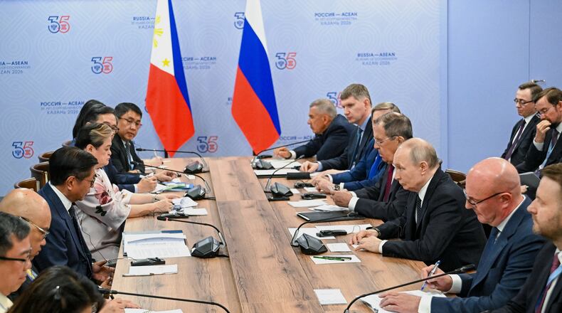 Russian President Vladimir Putin, third right, and Philippine President Ferdinand Marcos Jr. fourth left, attend the talks on the sidelines of the Russia-ASEAN summit in Kazan, Russia, Wednesday, June 17, 2026. (Sergei Bobylev/Sputnik, Kremlin Pool Photo via AP)