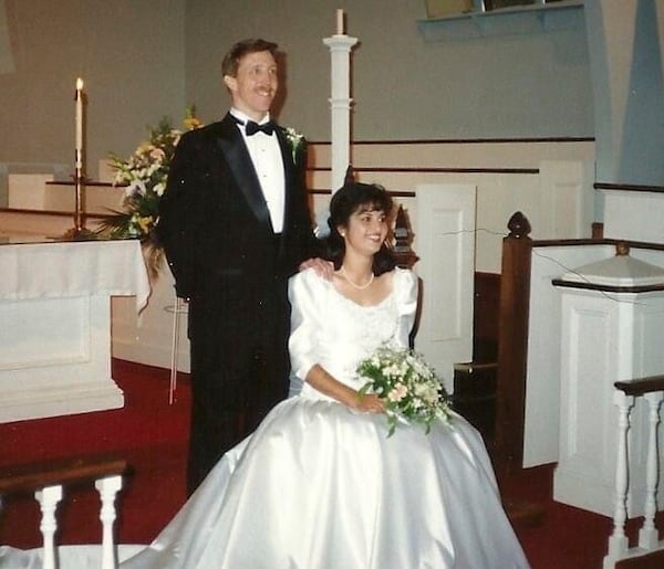 In this undated photo provided by her daughter, Mandonna "Donna" Kashanian, 64, sits with her husband Russell Milne at their wedding. (Kaitlynn Milne via AP)