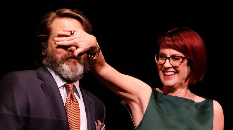 NEW YORK, NY - MAY 04: Actor Nick Offerman and actress Megan Mullally speak onstage at the 29th Annual Lucille Lortel Awards at NYU Skirball Center on May 4, 2014 in New York City. (Photo by Janette Pellegrini/Getty Images for The Lucille Lortel Awards)